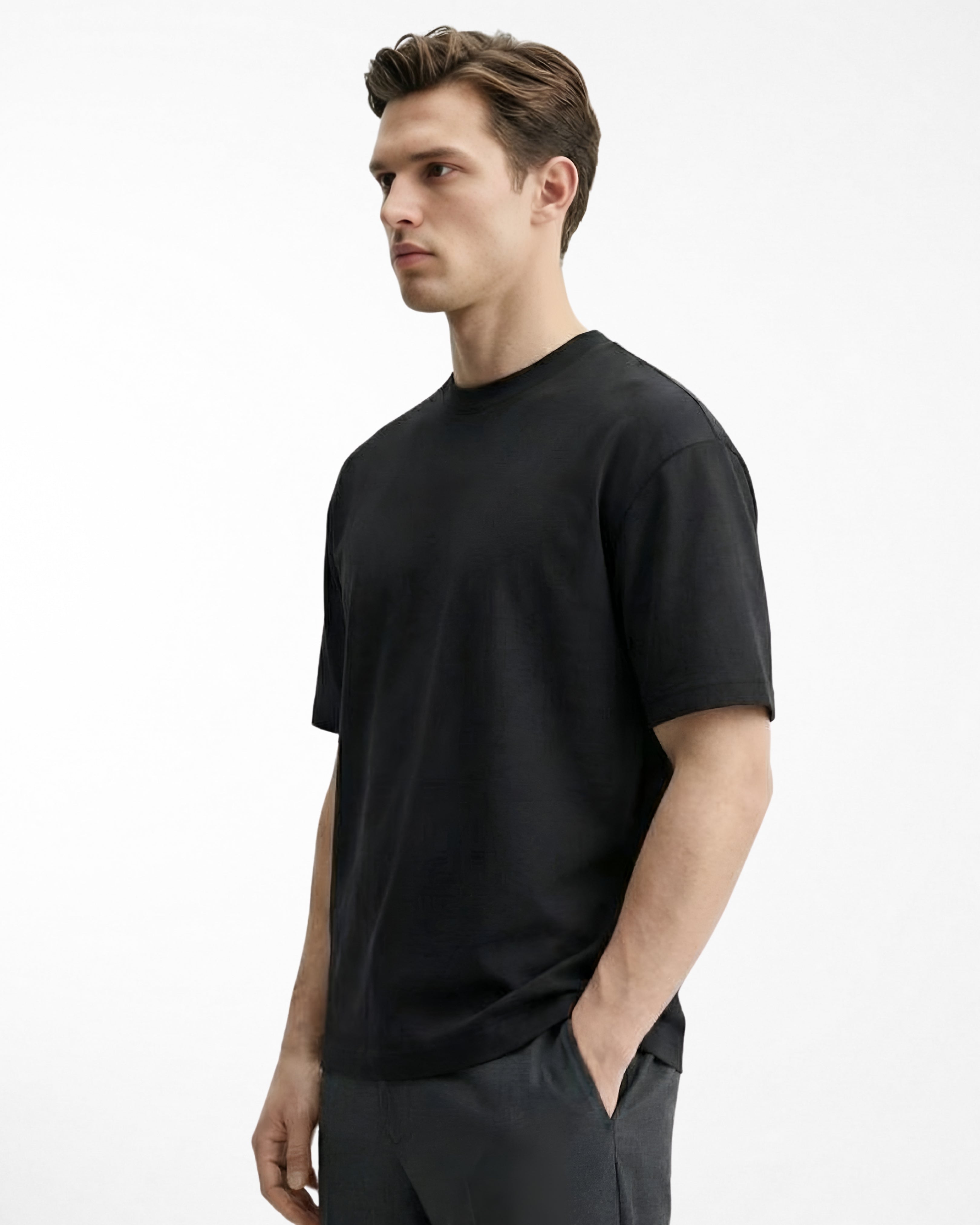 man wearing relaxed fit black tshirt