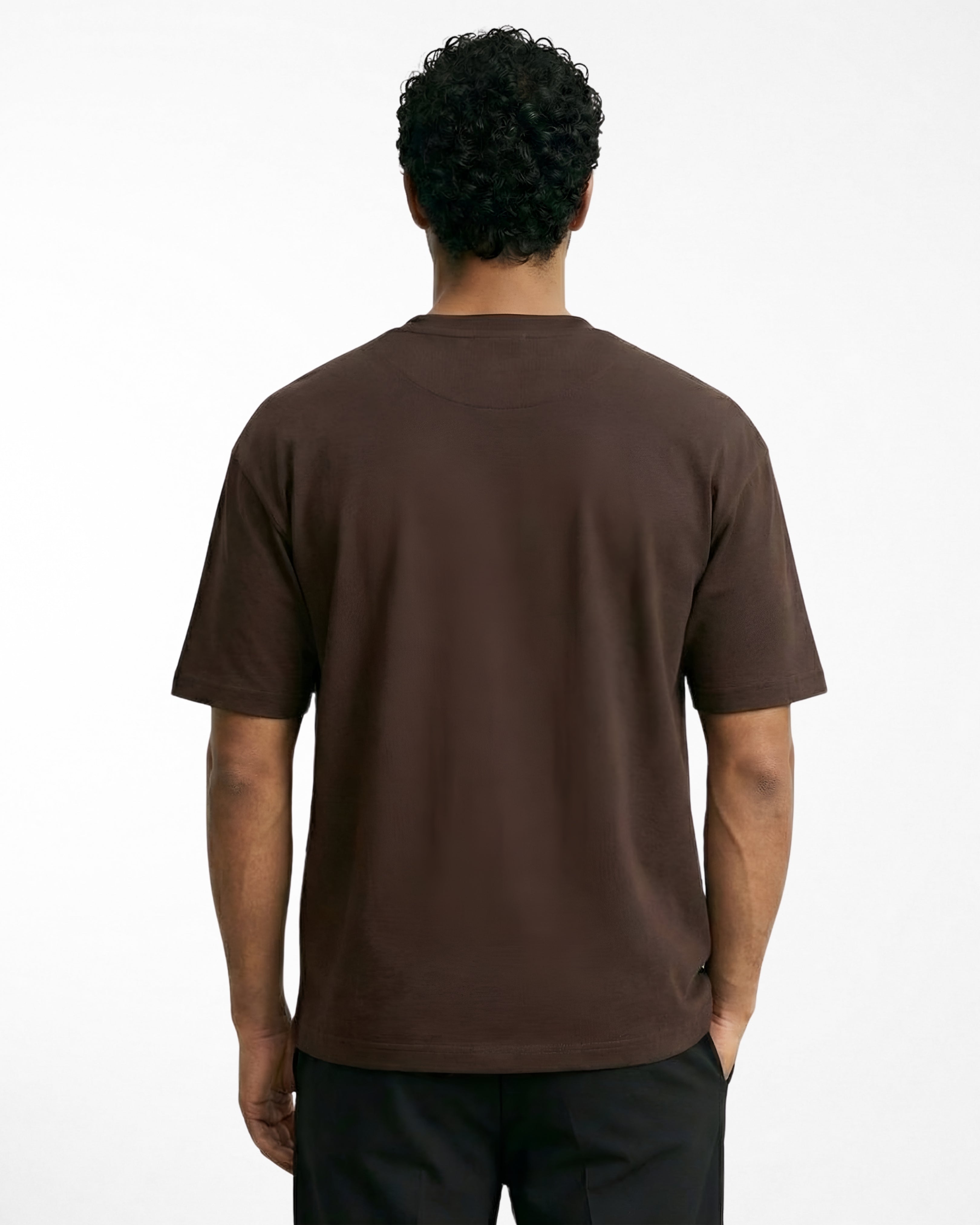 man wearing relaxed fit brown tshirt