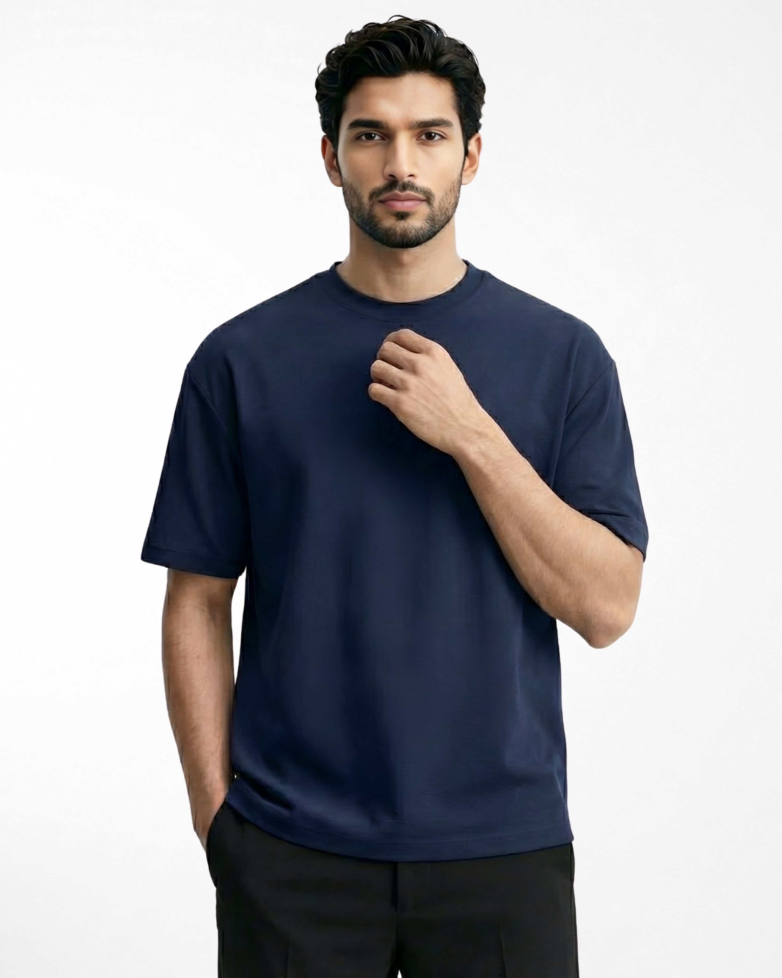 man wearing relaxed fit navy blue tshirt