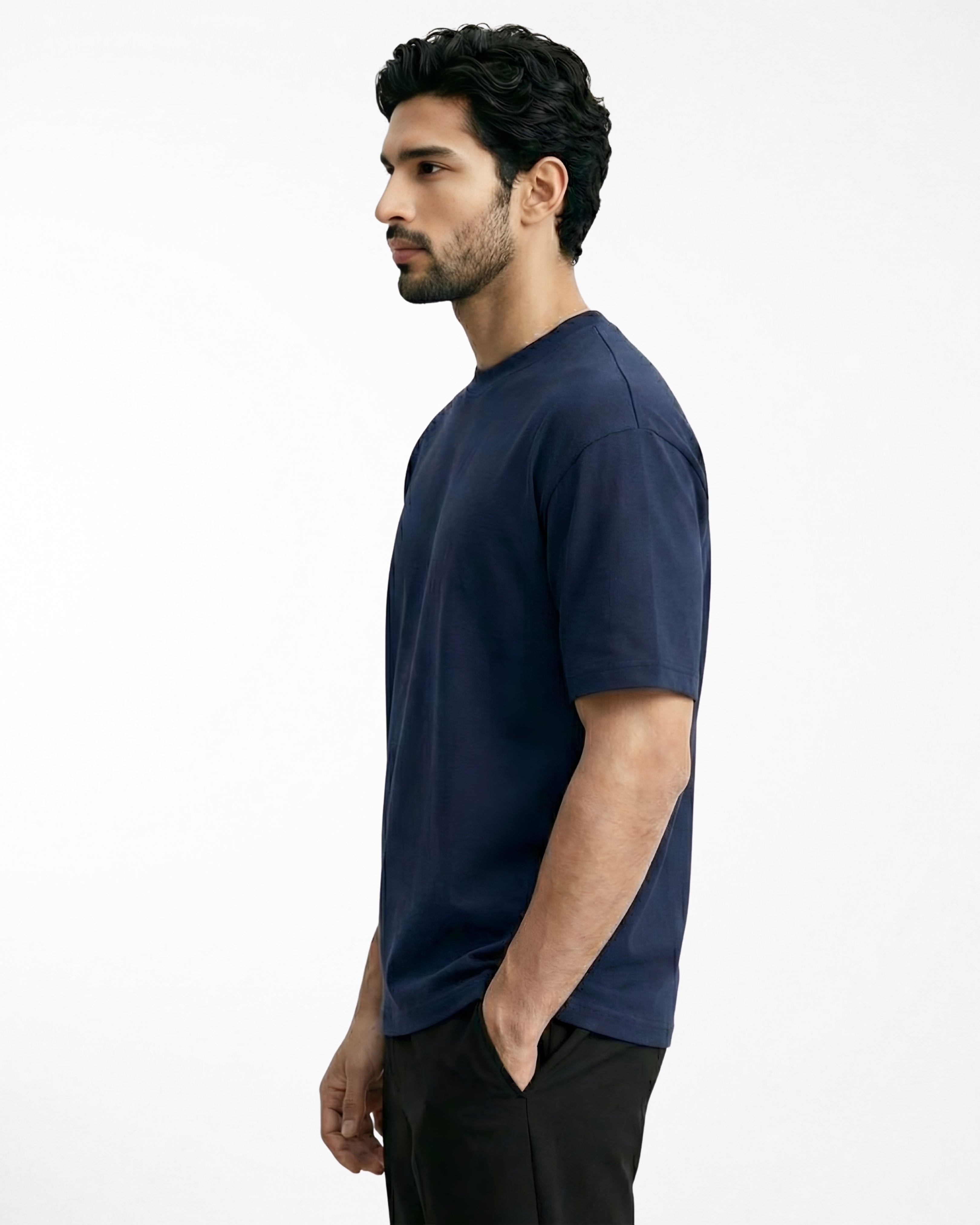 man wearing relaxed fit navy blue tshirt