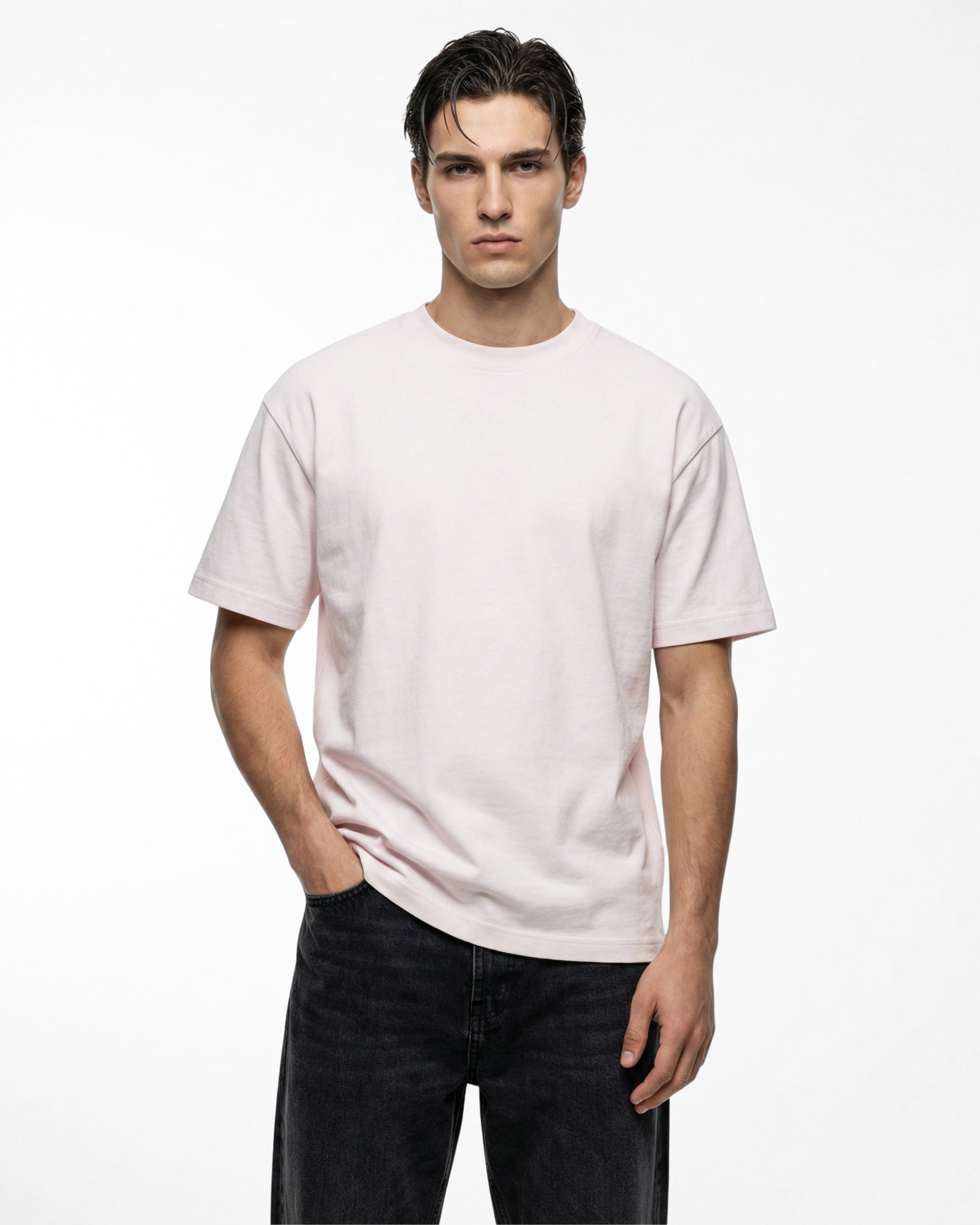 man wearing relaxed fit soft pink tshirt