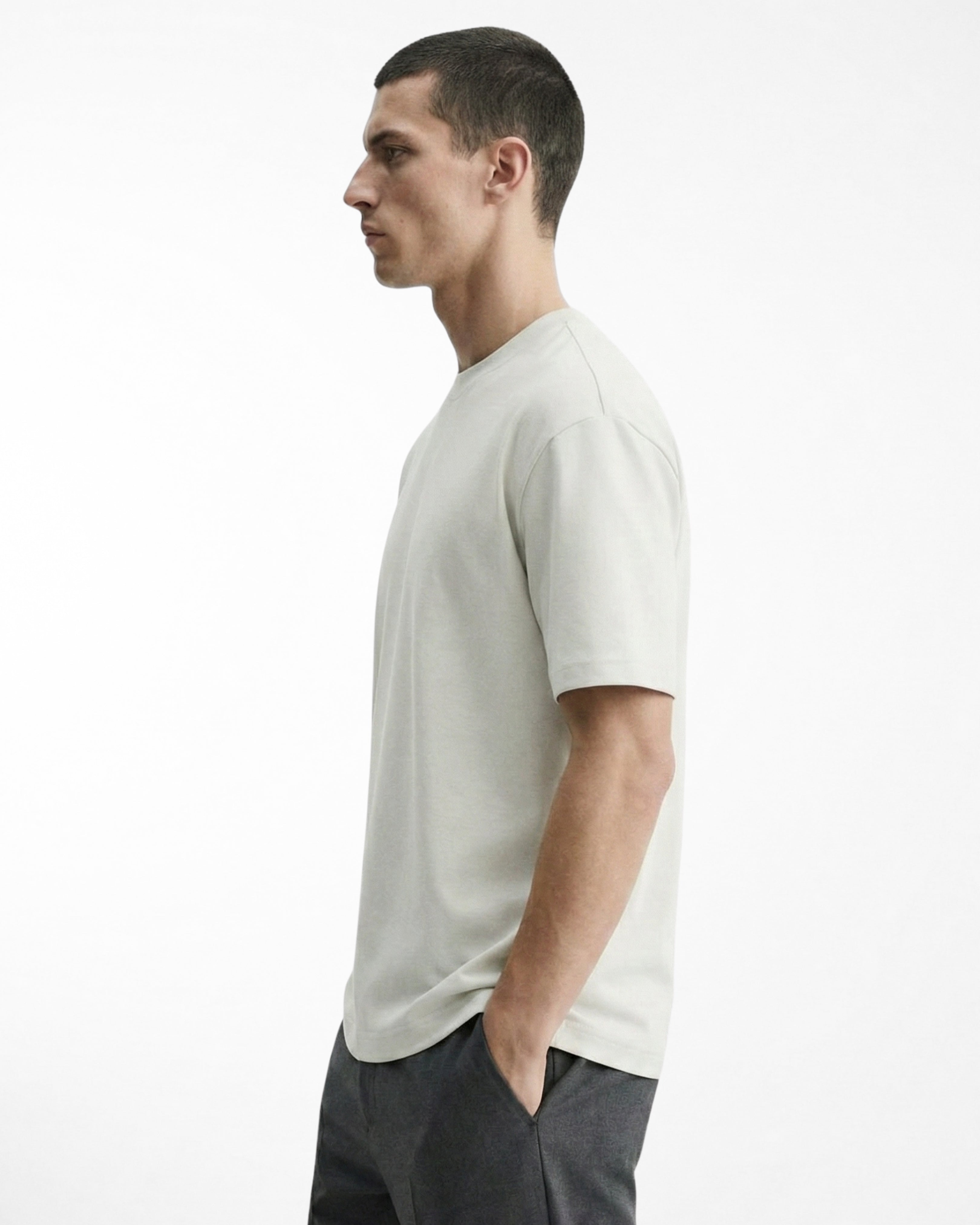 man wearing relaxed fit white tshirt