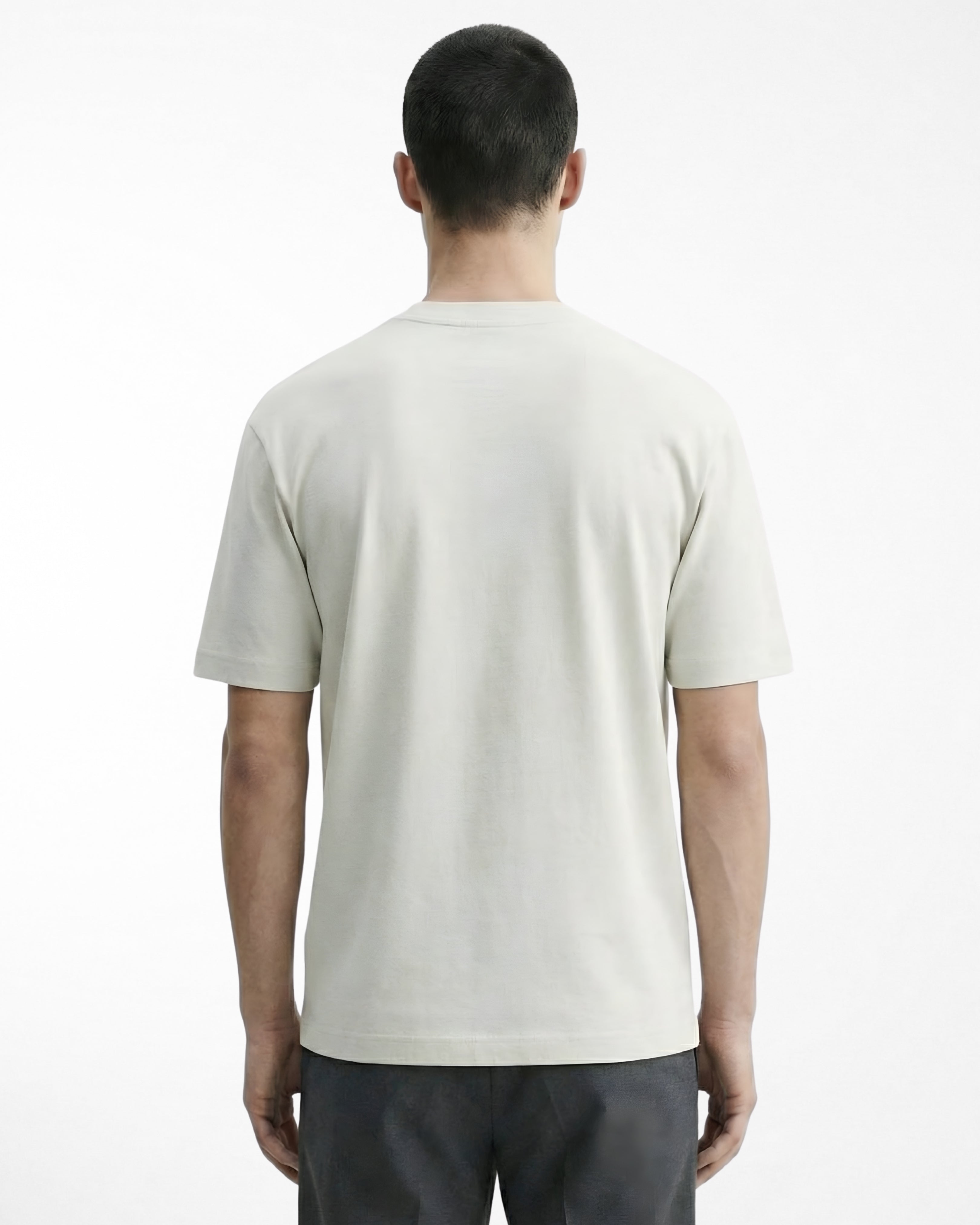 man wearing relaxed fit white tshirt