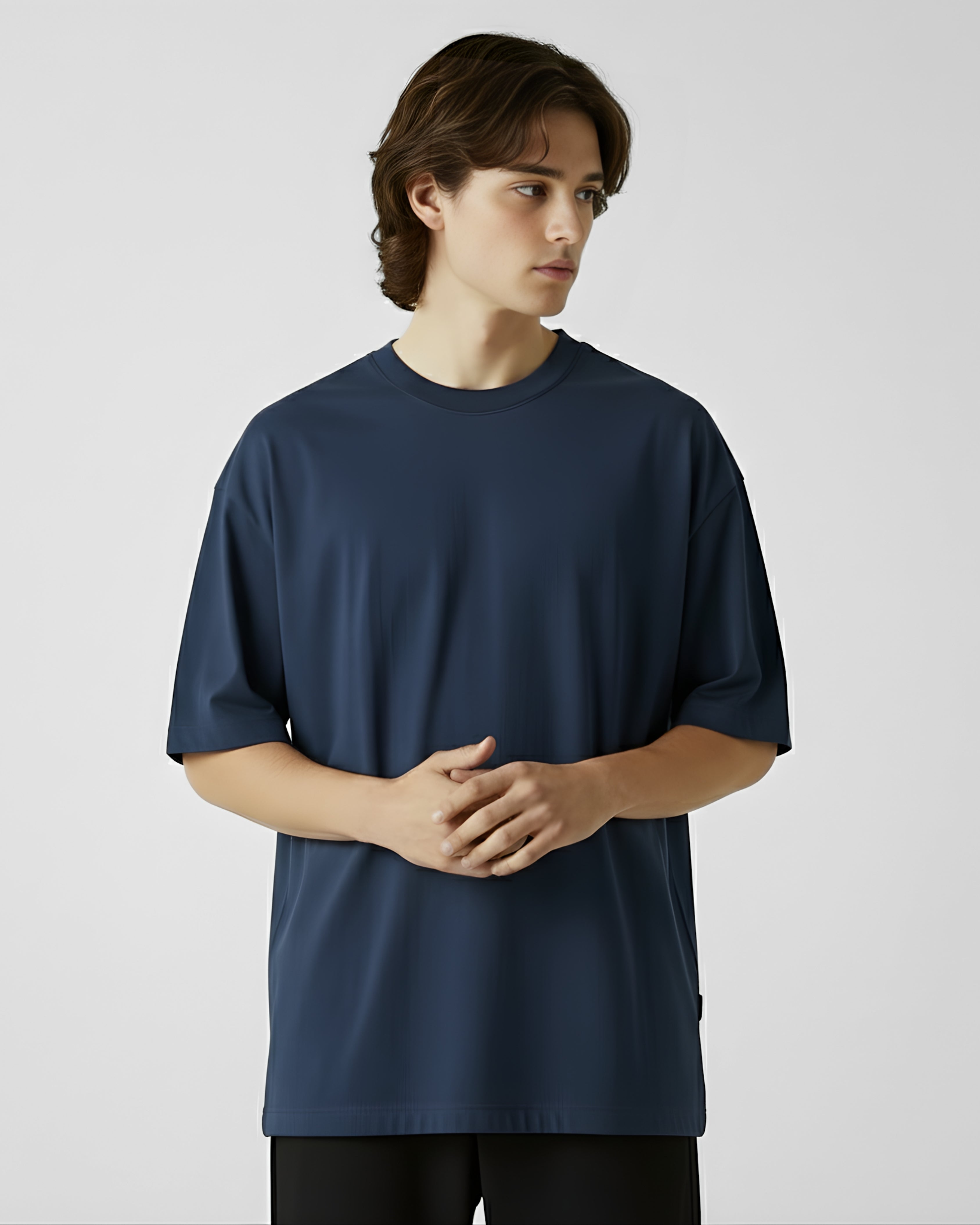 Person wearing a navy blue t-shirt against a plain background