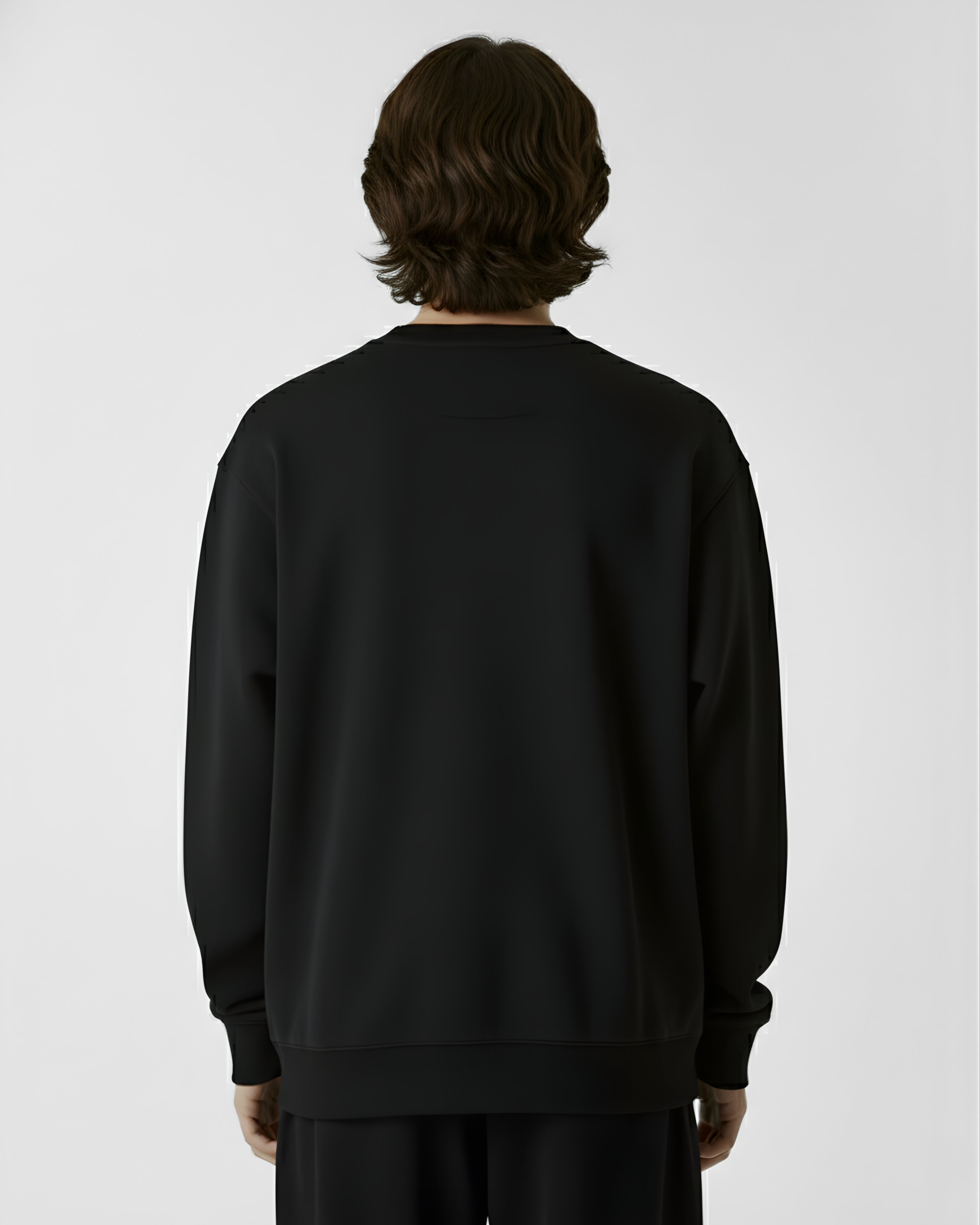 Person wearing a black sweatshirt on a white background