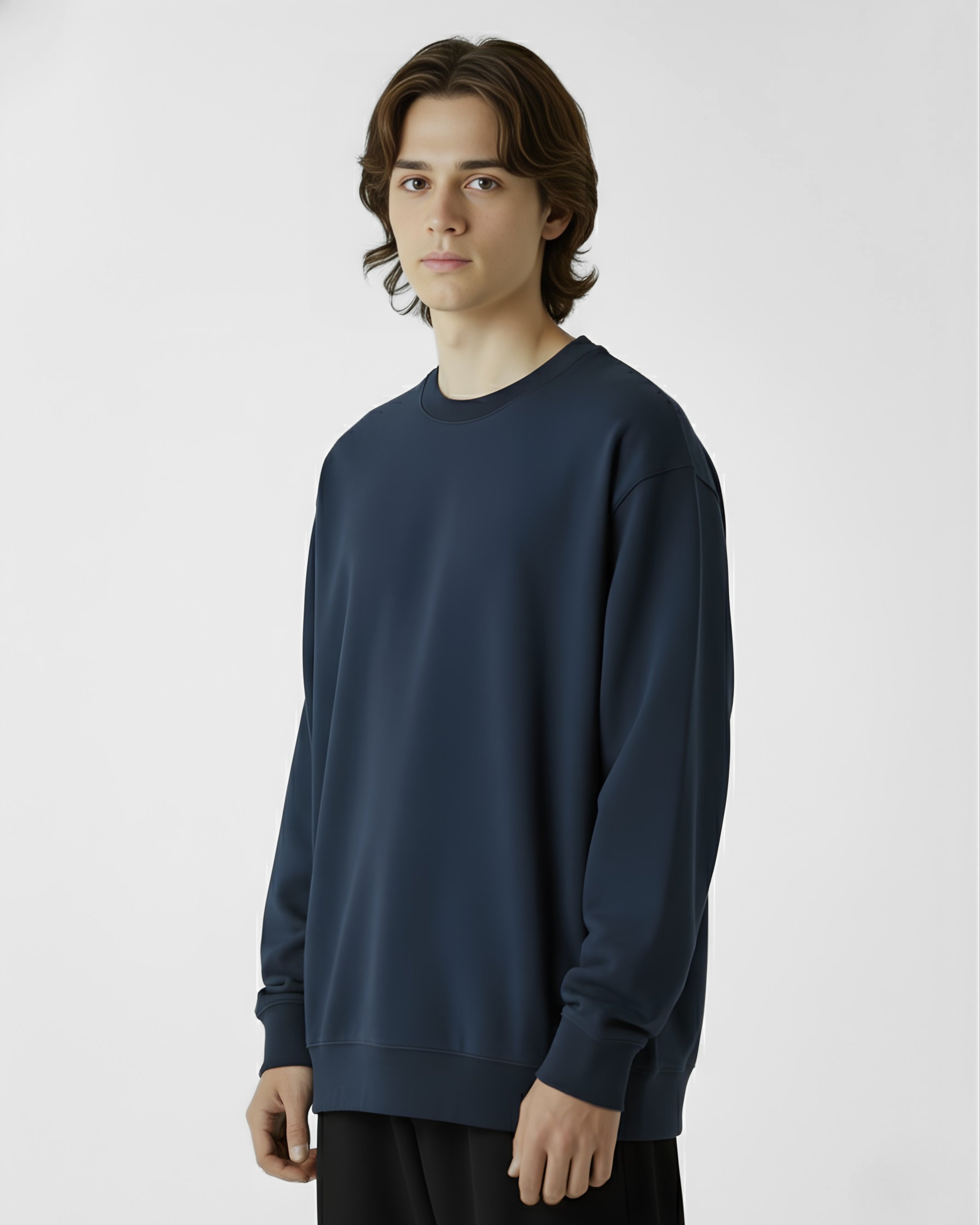 Person wearing a navy blue sweatshirt on a white background